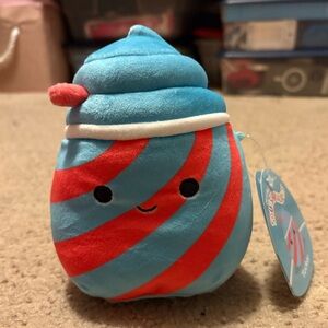 NWT Squishmallows blue and red swirly drink whose name is Tucker